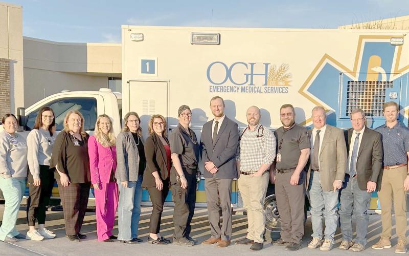 OGH WELCOMES NEW AMBULANCE—Members of the Ochiltree County Hospital District’s board of directors and the administration at Ochiltree General Hospital were on hand recently for the unveiling of a new ambulance and the new ambulance design. Pictured are, from left, CEO Kelly Judice, Assistant Chief Nursing Officer Kevelin Certantes, Chief Nursing Officer Lupe Cervantes, Chief Financial Officer Debbie Beck, Brooke Campbell, Lori Dollar, Steph Tarvin, Emily Flores, Dr. Tyler Kirklin, Dr. Blake DeWitt, Jeff Min