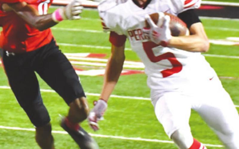 DISTRICT WIN Ranger Cuyler Feger (being defended by Lobo Matthew Bautista) one of several Rangers who had a big night on Friday against the Levelland Lobos. Feger caught six passes in the game, as the Rangers blew by Levelland, 44-10 to open district play.