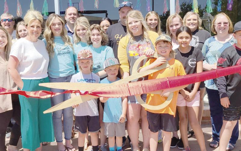 Members of the Perryton-Ochiltree Chamber of Commerce, along with friends, family, staff, and well-wishers were on hand for a ribbon-cutting ceremony for the grand opening of Bloomin Mesquite Boutique at 404 S. Main in Perryton. The clothing boutique is owned by Kylie Boothe.