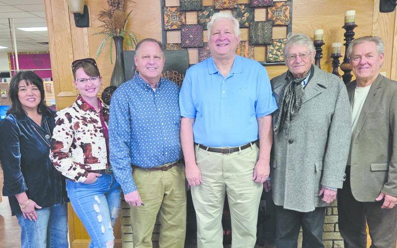 Perry Memorial Library celebrated its 100th birthday with an open house and reception on Nov. 9, including visits from a number of local authors. The authors at the reception included, from left, Diana Anderson, Cindy Escobar, Dr. Randy Skaggs, Gary Rinker, John Erickson, and Marlon Sparks.