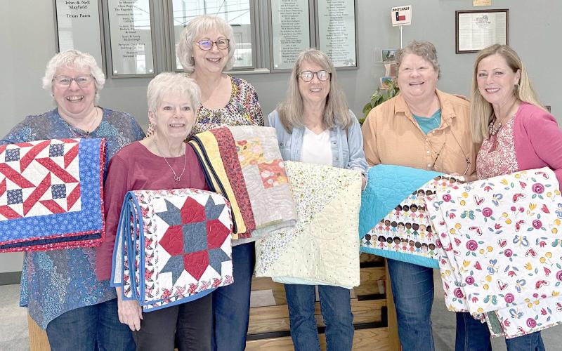 The Texas Panhandle Quilters Guild delivered homemade quilts to Perryton families affected by the tornado that struck the city on June 15. The original goal for the project was to make and deliver 25 quilts, but that number grew to 48 as more members of the guild wanted to participate. Pictured are some of the Amarillo area members who delivered quilts in early October, including, from left, Lucille Dudley, Pat Drake, Kathy Jones, Susan Kraft, Nancy Owen, and guild president Sherrie Elliott.