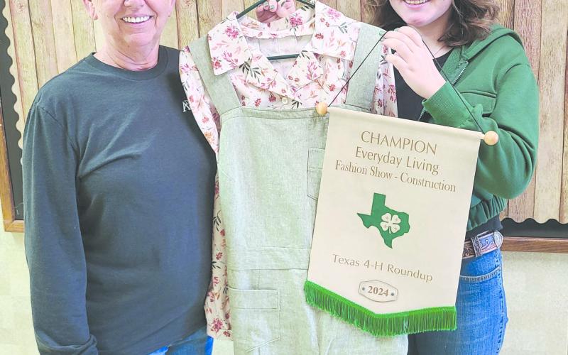Rylan Oquin will compete at the 4-H Family and Consumer Science National Championship and Conference this month in San Antonio. The six-year 4-H student will compete in the national invitational competition in the Fashion Review category using the jumper and blouse she created for the state 4-H contest. Pictured are, from left, Ochiltree County Texas A&amp;amp;M Agrilife Extension Secretary Ruth Ann Splan and Oquin.