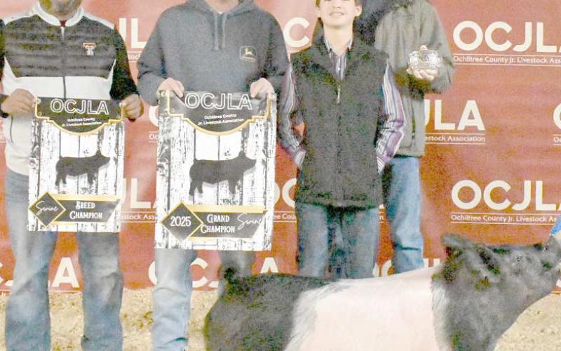 At the Ochiltree County Junior Livestock Show and Sale on Jan. 17-18, Conner Pribble took home the award for Grand Champion Swine. His animal was purchased by Western Equipment, 21 Farms, Joyce Smith, Farnsworth Seed, and Pribble Farms. Pictured are, from left, Ramon Vela, Jason Lilly, Connor Pribble, and David Peckenpaugh. ( Photo Credit: Morgan Dudley)