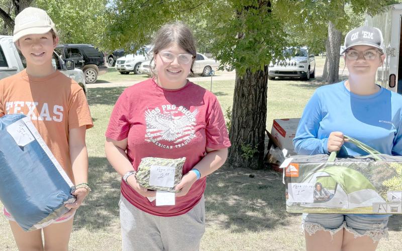 Young anglers showed up to compete in the Children’s Fishing Tournament at Lake Fryer and Wolf Creek Park at the beginning of June. The annual fishing tourney is hosted by the Wolf Creek Park Improvement Board. The top prize winners in the ages 11-14 category were, from left, Annalise Cotta (third place), Autumn Gonzales (second place), and Khole Scott (first place).
