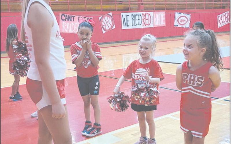 Sure, there are drills and cheer practice and learning dances and all the hard work, but half the fun of cheer camp has got to be hanging out with the big cheerleaders, right? Perryton Junior High School’s cheerleaders hosted the PJH Mini Cheer Camp this week from Monday through Wednesday. Future cheerleaders in grades kindergarten through fifth grade were welcome to attend.