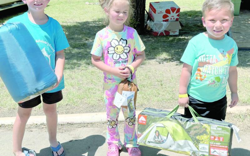 Kids turned out in droves for the Children’s Fishing Tournament at Lake Fryer and Wolf Creek Park at the beginning of June. The top prize winners in the ages 3-6 category were, from left, Granger Mills (third place), Emmalyn Lamb (second place), and Jesus Salazar (first place).