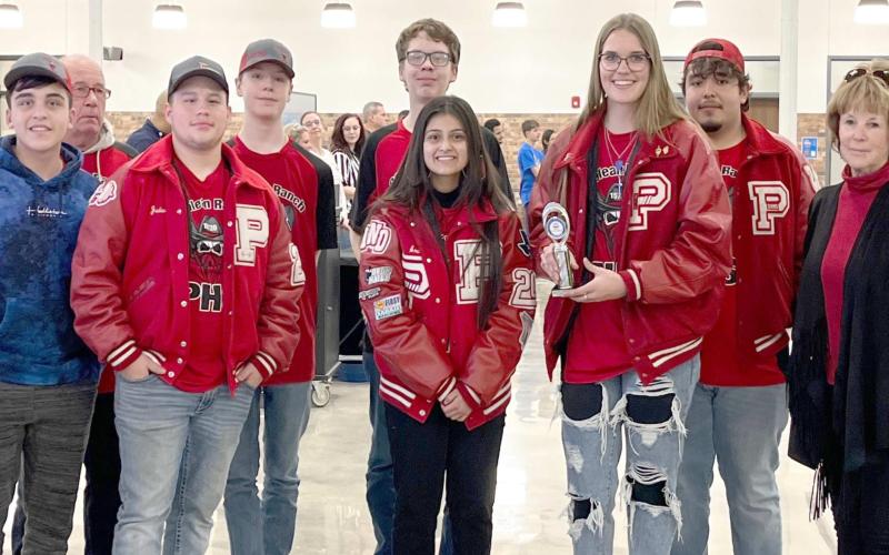 ROBOTS TO REGIONALS—Perryton High School’s Robotics Team, nicknamed the Boolean Ranch, is heading to Regional competition later this month in Lubbock. Pictured are, from left, Andy Montes, mentor Doug Caddel, Jayden Rodriguez, Trenton Estes, Kayve Temple, Araseli Llamas, Isabella Hansen, Manuel Granillo and PHS Robotics Coach Sandy Woods.