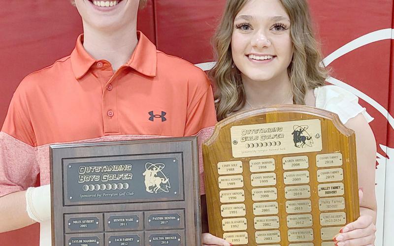 OUTSTANDING GOLFERS NAMED AT BANQUET— Brandon Thomas, left, was awarded the boys’ Outstanding Golfer award, with Aubrey Daugherty winning girls’ Outstanding Golfer during Perryton High School’s annual All Sports Awards Banquet at the high school.