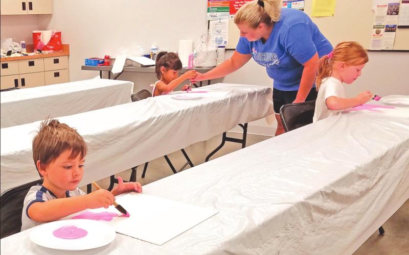 PEEWEE PUPILS PAINTING PINK PAGES