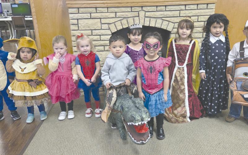 Halloween came a little early for kids attending Story Time at Perry Memorial Library on Wednesday morning. Kids got to dress up to show off their Halloween costumes before enjoying some snacks, crafts, and a good story. Story Time takes place every Wednesday from 10-11 a.m. at the library. The program, for kids from 2-4 years old, is free, but library staff request you call ahead and register so they know how many crafts they’ll need to make.