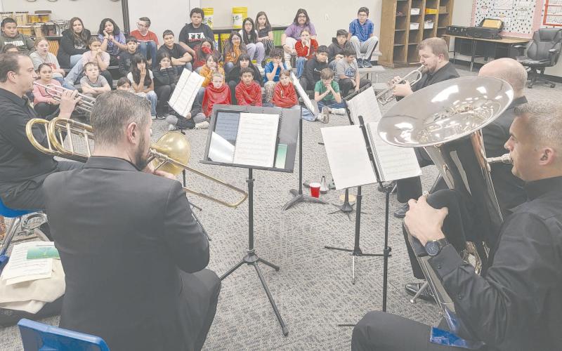 The Amarillo Symphony Brass Quintet visited Williams Intermediate School on Nov. 28 to perform for students in music classes and to answer questions about their instruments and other music-related topics. The quintet performed later that evening at the Perryton Junior High School Auditorium in a concert to benefit the Pathways Scholarship Program.