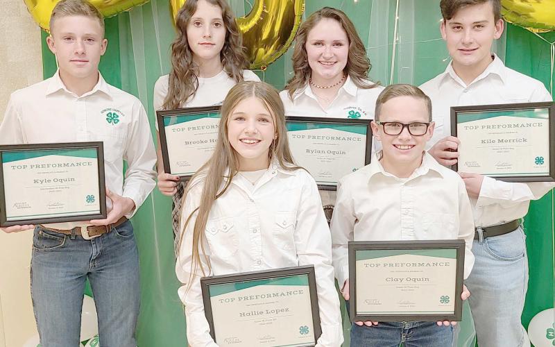 HIGH POINT WINNERS— Ochiltree County 4-H held itsannual awards ceremony Oct. 9 at the Ochiltree County Expo Center. The High Point Award winners were, from left, front row, Hallie Lopez and Clay Oquin; and back row, Kyle Oquin, Brooke Helker, Rylan Oquin, and Kile Merrick.