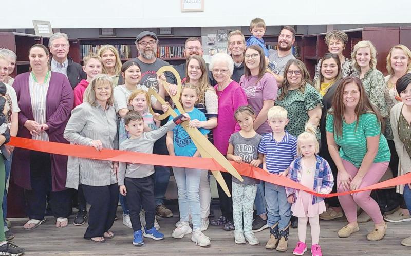 RIBBON CUTTING FOR PINK ROSE BOOK SHOP