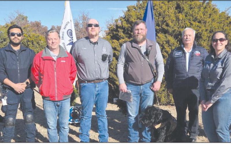 The Wreaths Across America ceremony on Saturday, Dec. 13, featured special recognition for Ochiltree County’s first responders. Pictured are, from left: Mike Hicks, Angel Ornelas, Jason Vanosdol, Thomas Beal, Jeff Mincy, Perryton Fire Chief Paul Dutcher, Olivia Thompson, Ochiltree County Chief Deputy Wayne Floyd, and Amanda Cowan.