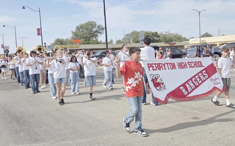 Thousands of Ochiltree County residents showed up to watch the Wheatheart of the Nation Celebration parade on Main Street on Saturday, Aug. 22. The winner of the Large Band category was Perryton High School’s Ranger Band.