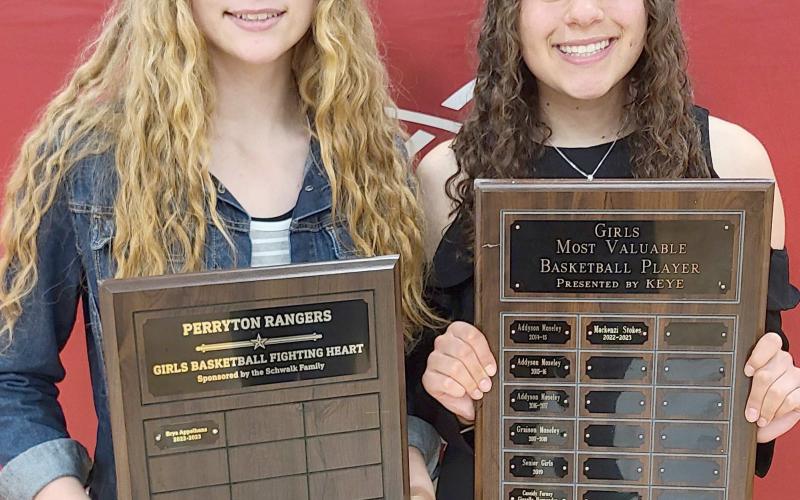 HONOREES IN GIRLS HOOPS— Perryton High School’s girls basketball team was honored on May 1 at the Perryton High School All Sports Awards Banquet. Pictured are, from left: Brya Appelhans, winner of the Fighting Heart award, and MVPs Mackenzi Stokes.