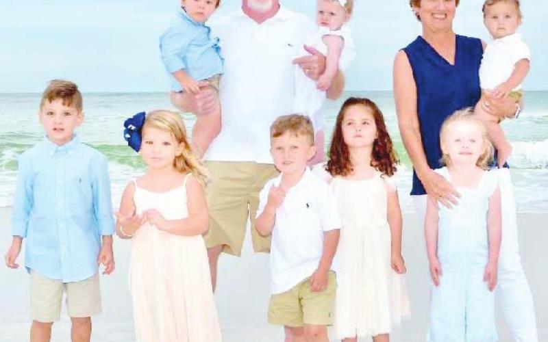 Rex and Donna Mann with their grandchildren