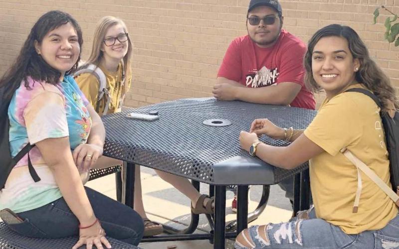 TAKING A BREAK FROM CLASS-Frank Phillips College Allen Campus students, from left, Rubi Borjas, Abby Feger, Jose Rosales and Ashley Flores are part of the Pathways program, which provides tuition, books and fees for eligible Perryton High School students while in high school and then while attending community college. The Pathways program has been very successful, with over 90 participants.
