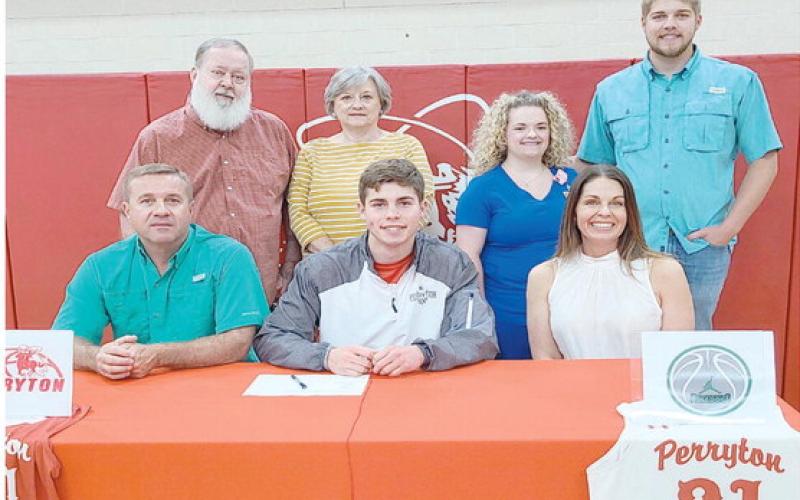 PSHIGODA SIGNS WITH CLARENDON— In May, recent Perryton High School graduate Tad Pshigoda officially signed a letter of intent to play basketball at Clarendon College. Pictured are, from left, front row: Brian Pshigoda, Tad Pshigoda, and Tamarachena Pshigoda; back row: Vernon Pshigoda, Jean Pshigoda, Lexi Pshigoda, and Dillon Pshigoda.