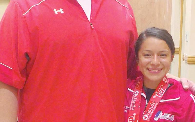 Coach Casey Arruda with world champion powerlifter Janet Becerril