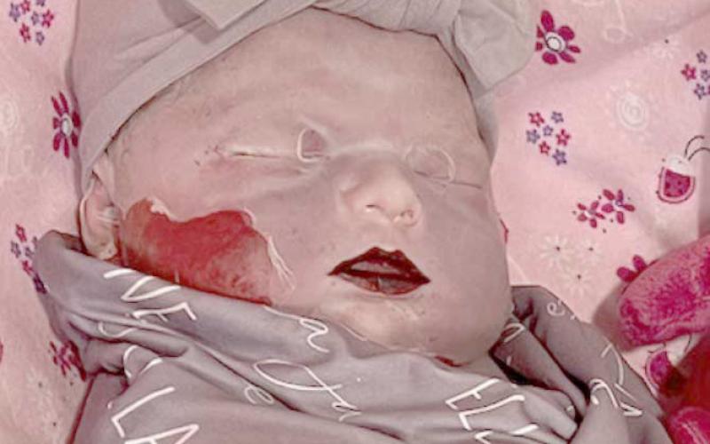 Rites held for Thomas infant