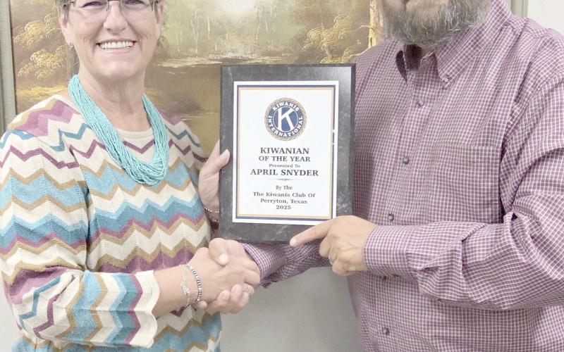 KIWANIAN OF THE YEAR— The Perryton Kiwanis Club recognized April Snyder as their Kiwanian of the Year for 2025 during their annual banquet on Tuesday, Sept. 9. Pictured are, from left, Snyder and Kiwanis president Chase Allison.
