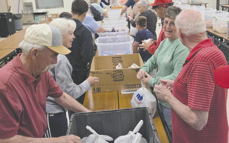 Local volunteers for Snack Pak 4 Kids gathered recently at Williams Intermediate Elementary School to pack snacks for hungry kids. Volunteers meet every few weeks to pack snack bags with nutritious food to help food-insecure students stave off hunger. Volunteers include students from Perryton High School, local business employees, church groups, and people who just want to help. Pictured are, from left, Sammy Judice, Carol Hayden, April Snyder, and Robert McCoy.