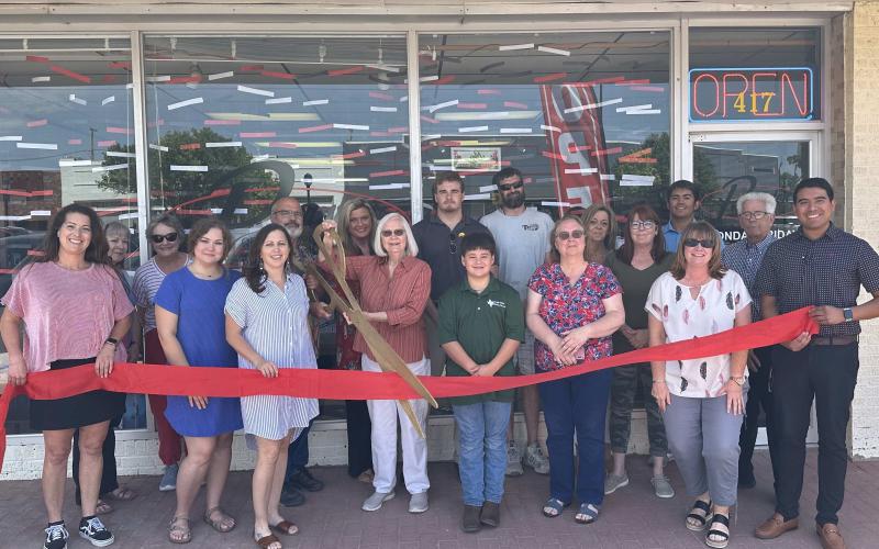 RIBBON-CUTTING AT PERRYTON OFFICE SUPPLY – Members of the Perryton-Ochiltree Chamber of Commerce, along with friends, family, staff, and well-wishers were on hand recently for a ribbon-cutting ceremony for Perryton Office Supply at 417 S. Main in Perryton. The office supply and equimpent store is owned by Kelly King.