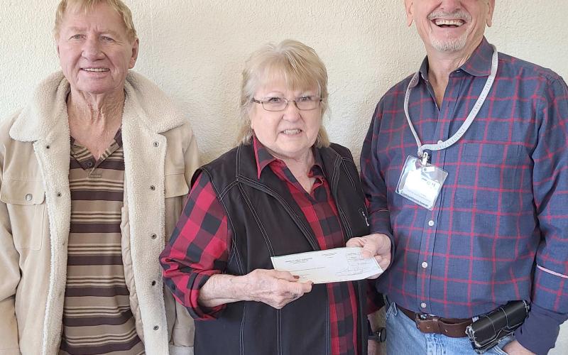 HOSPICE VOLUNTEERS RECEIVE DONATION— Hospice of OGH Volunteers received a donation of $4,900 from Randy and Janice McLain. November is traditionally the Hospice Volunteers’ fundraising month, but the organization will accept donations any time of year. Donors can send donations to Hospice of OGH Volunteers, 3019 S. Main in Perryton. Pictured are, from left, Randy McLain, Janice McLain, and Mike Blank, president of the Hospice Volunteers.