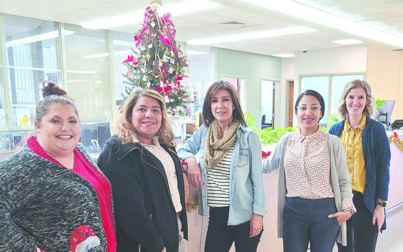 GIVING TREE SET UP FOR DONATIONS AT CITY HALL The City of Perryton has set up their Giving Tree in City Hall to assist local senior citizens who have difficulty paying their winter heating bills. Anyone can make anonymous donations to help pay utility bills for area seniors. Pictured with the tree are, from left, city employees Tanisha Anderson, Patty Martinez, Laura Rivera, Sandra Sosa, and Ellie Blasingame.
