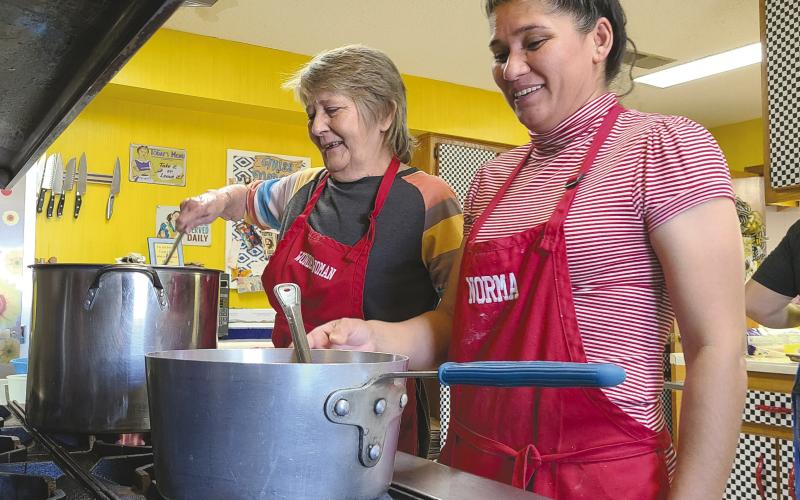 CHOW IS SERVED Perryton’s Senior Citizen Center is still cooking and serving their popular lunches three times a week. Pictured cooking up lunch on Friday were, from left, Nancy Cain and Norma Gonzalez. Menus for the center’s lunches appear in Senior Center director Daryla Allred’s column every week.