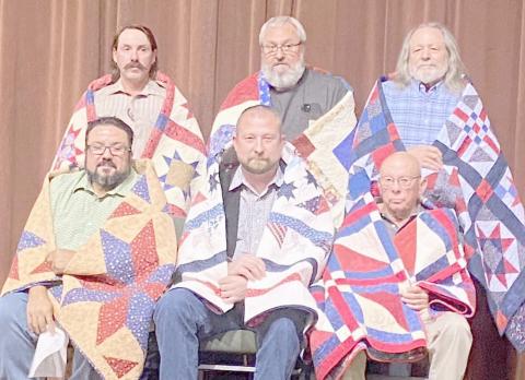 QUILTS OF VALOR PRESENTATION— The Friendship Quilt Guild held its annual Quilts of Valor presentation on Oct. 16. The first six recipients included, first row, from left, Frank Salgado Jr., Bear Knox and Butch Baker; and second row, Jordan Thomas, Freddy Bohannon and Terry Pillars.