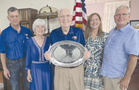 The Museum of the Plains recognized Dempsey Malaney as the museum’s Patron of the Year on Tuesday evening. Malaney, who has previously served as a county commissioner and is currently the county’s Veterans Service Officer, has led the museum’s security committee, assisted with facility maintenance, and helps in the museum gift shop in his spare time. Pictured are, from left, president of the museum board Jim Lear, Kara Malaney, Dempsey Malaney, daughter Bonnie Buckley, and Bruce Buckley.