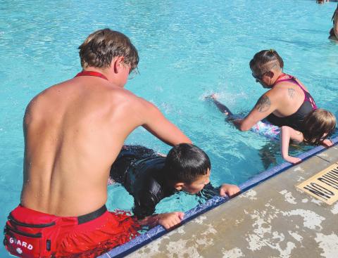SWIMMING IS A KICK