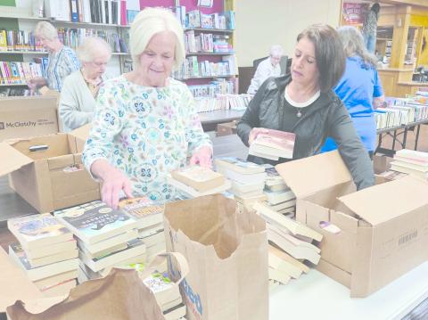 The Jennie June Club of Perryton will hold their fall Book Sale for 2026 at Perry Memorial Library during the month of October. Patrons can buy used books and videos at a bargain price, one dollar for hardbacks, 50 cents for paperbacks and $1 for videos during the month. Among the club members setting up for this year’s sale were Cynthia Adreas and Susie Najera.