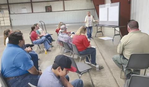 Ochiltree County residents gathered recently at the Expo Center to hold a Texas Community Futures Forum, sponsored by Texas AgriLife Extension Service. The purpose of the Futures Forum is to compile lists of what local residents believe are the most important issues facing their communities. Pictured is the group considering issues in Youth Development, moderated by Ruth Ann Splan.