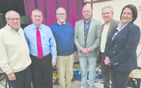 Perryton High School’s annual Veterans Day program brought together students of all ages to honor local veterans. In addition to presentations recognizing every veteran attendee, there were also musical and poetry performances. Pictured are, from left, registration volunteer Ken Splawn, Bill Bob Thrash and Keith Harris, who both led recognition of veterans, prayer leader Duce Cooper, master of ceremonies Marlon Sparks, and registration volunteer Lisa Yauck.