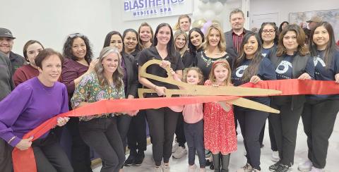 RIBBON CUTTING FOR BLASTHETICS AND AREA EYE CENTER— Perryton-Ochiltree Chamber of Commerce members, along with staff, family, and well-wishers, gathered recently for a ribbon-cutting ceremony to commemorate the grand opening of Blasthetics and Area Eye Center at 2309 S. Cedar in Perryton. Blasthetics is owned by Megan and Jay Blasingame, and Area Eye Center is owned by Dr. Stephanie Pulpan.