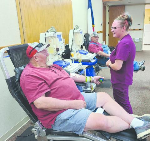 Coffee Memorial Blood Center in Amarillo held a blood drive on Tuesday afternoon at Frank Phillips College, Allen Campus. The drive had a goal of 19 donations, but only had a total of 12 successful donations. Pictured are, from left, Andy Anderson, who is working toward his own goal of donating nine gallons of blood, phlebotomist Ashley Norman, and in back, Sid Tanner.