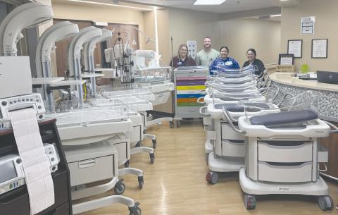 OGH RECEIVES OB EQUIPMENT THROUGH GRANT— Ochiltree General Hospital received a bounty of new obstetrics equipment recently through a quarter-million dollar Rural Hospital Labor and Delivery Grant from the state. The equipment included four fetal heart monitors, five warmers to keep babies warm after birth, six infant cribs, two wireless monitors, and more. Pictured in the back are, from left, Debbie Beck, CFO, who wrote the grant, Patrick Smith, BSN, Kevelin Cervantes, CNO, and Rubi Estrada, ACNO.