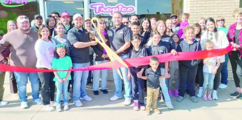 RIBBON-CUTTING HELD AT EL TROPICO— Members of the Perryton-Ochiltree Chamber of Commerce, along with friends, family, staff, and well-wishers were on hand for a ribbon-cutting ceremony for El Tropico at 10 SW 4th in Perryton. The ice cream shop is owned by Rafael Estrada And Gerardo Delgado.