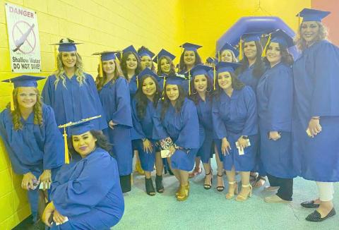 COSMETOLOGY STUDENTS GRADUATE