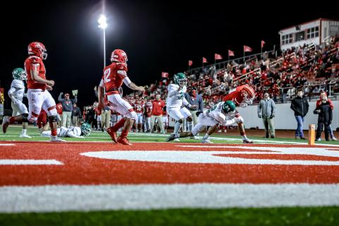 Pepper Haley leans for a touchdown against Monahans Friday night in the Bi-District Championship against Monahans (Photo by John Erickson)