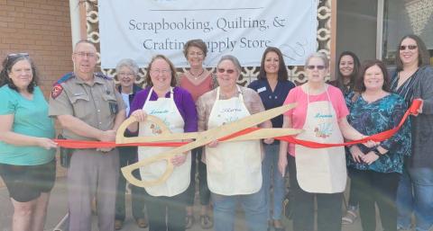 RIBBON CUTTING FOR PAPER AND CLOTH MEMORIES—Perryton-Ochiltree Chamber of Commerce members gathered Tuesday afternoon for a ribbon-cutting ceremony to commemorate the grand opening of Paper and Cloth Memories at 218 SW 3rd Avenue in Perryton. The crafting, quilting, and scrapbooking supply store is owned by Sharon Jenkins and Brenda Austin.