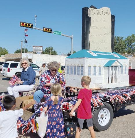 PARADE WINNERS - SECOND PLACE NON-PROFIT—Ochiltree County residents lined Main Street on Saturday, Aug. 19 to watch the annual Wheatheart of the Nation Celebration parade. The second place prize for the Non-Profi t Float category went to the Wolf Creek Chapter of National Society Daughters of the American Revolution.