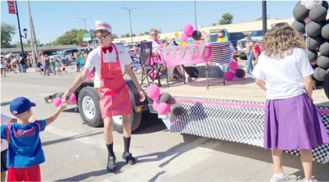 SECOND PLACE COMMERCIAL—It seems like everyone turned out to watch the Wheatheart of the Nation Celebration parade down Main Street. Creative Collections Boutique took home the second place prize in the Commercial Float category.