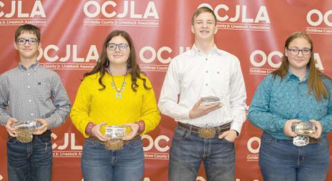 SENIOR RESERVE SHOWMANSHIP—The Senior Showmanship Awards were presented to students at the Ochiltree County Junior Livestock Show and Sale on Jan. 19-20. Pictured are, from left, front row: Jake Schickedanz, Karson Pribble, Nathan Miller, and Alexis Goldsberry. (Photo Credit: Tessa Powell)