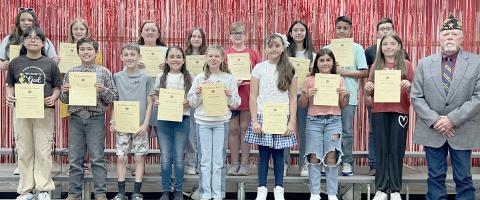 FIFTH GRADE CITIZENSHIP AWARDS—Williams Intermediate School held their end-of-year awards ceremony. Two students from each homeroom were presented with the American Legion Outstanding Citizenship Award. Fifth graders who received the award included, from left, front row: Jazlyn Ontiveros, Oseas Zavala, Madden Scarnati, Joyci Rosales, Rylee Merkel, Esmeralda Ochoa, Marilyn Ramirez, Viviana Chavira, and J.W. Hardy from the American Legion; back row: Chantel Rodriguez, Kaylynn Roberson, Paisley Kerl, Conli Mog