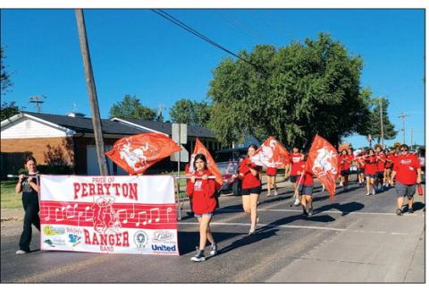 MARATHON MARCHING The Pride of Perryton Ranger Band held a March-a-Thon Saturday morning as they took a three-mile march from the high school, to Williams Intermediate, over to Stark Park, across to Perryton Junior High School, and then back to PHS. The event helps raise funds for the band’s spring trip, helps offset the costs of this year’s marching show, and gets band members a little more marching practice before Saturday morning’s Wheatheart of the Nation Celebration parade.