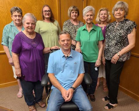 GRAY CLUB DONATES TO JIREH– The Gray Club of Balko, OK donated a new office chair to Jireh Ministries earlier this month to replace furniture lost in the June 2023 tornado. The Gray Club was started in Balko over 70 years ago. They hold an annual pecan fundraiser and use the proceeds to provide scholarships and donate to the Panhandle Crisis Center, the Mutt Hutt, and others. Pictured with Jireh Outreach Ministries Director Jason Vanosdol (front, center) are club members, front row from left, Carolyn Bartel